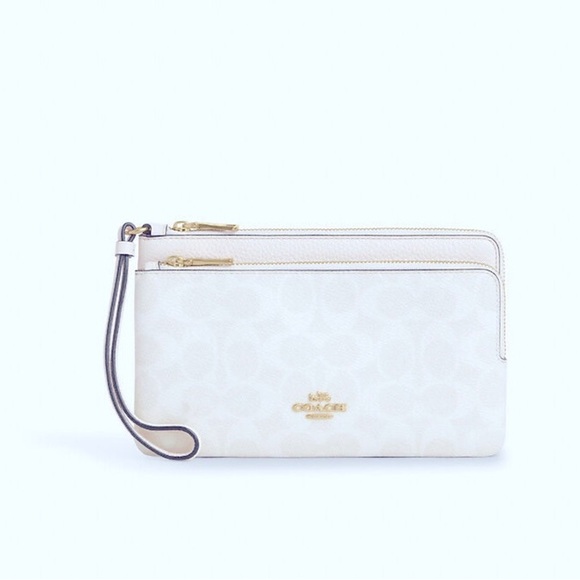 Coach Handbags - BRAND NEW Coach White Wristlet with Gold Hardware